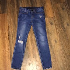 ripped dark wash jeans